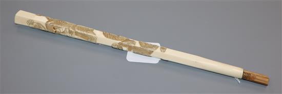 An ivory parasol handle